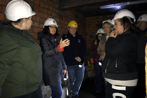 Kindred Spirit Investigations group tour in hard hats
